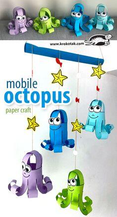Пін може містити: the octopus mobile is made from paper and has stars hanging from it's sides