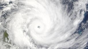 Listening. Natural Disasters. Text "Hurricanes: Powerful Storms"