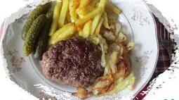 Страви із смаженого мяса яловичини порційними шматками.