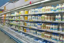 Milk And Others Dairy Production On Shelves Of Shop. Shop Of Dairy Products. Wide Choice Of Milky Goods. Big Milky Shop. Dairy Department In Supermarket. Wide Assortment Of Milk In Supermarket Stock