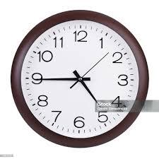 Quarter To Five On A Round Clock Stock Photo - Download Image Now - Circle, Clock, Clock Face - iStock